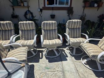 6 vuntage swevil chairs with cusions