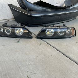 E39 Bumpers, Headlights, And Window Regulator