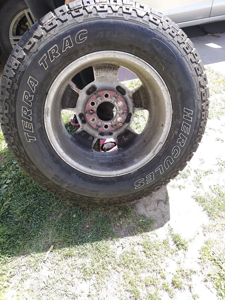 4 TIRES ALL WITH RIMS ALL THE SAME 