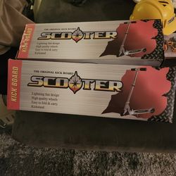 2 New Kids Scooters