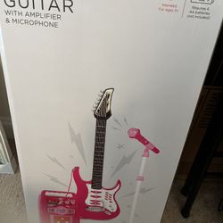 Child’s Electric Guitar and Microphone 