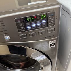 LG front loader washer excellent condition running very good no problems clean no scratches big caapisty asking $300 paid $1200