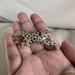 Elegant Gold and Black Leopard Brooch