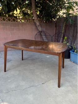 Antique Solid Wood Dining Table.  It needs some restoration,. 60” x  36” x  30” H