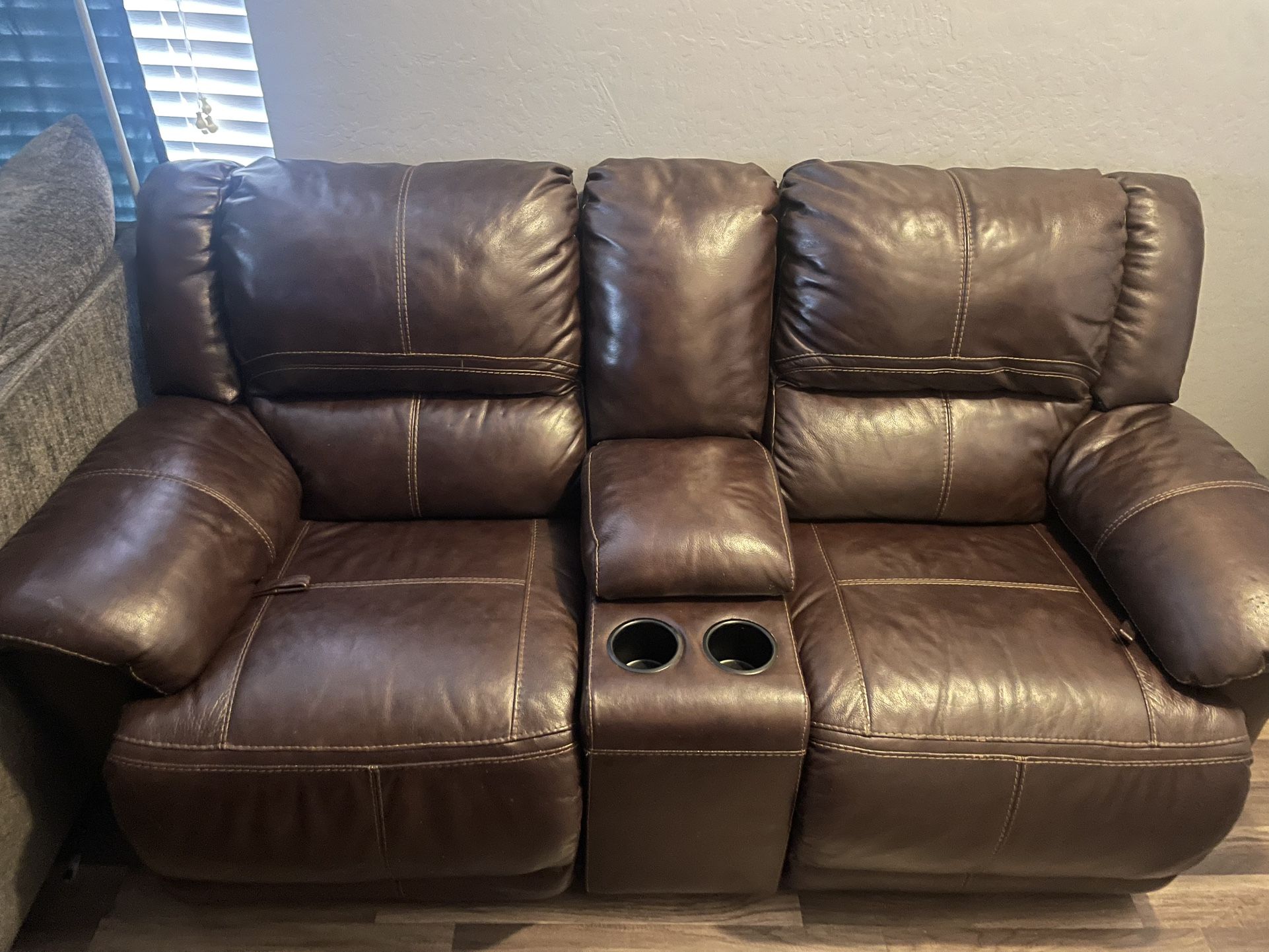 Leather Reclining loveseat