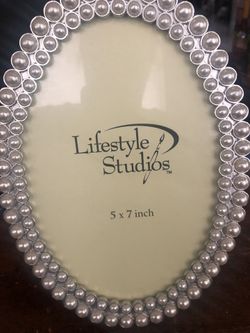 Farmers ovoid w pearl very nice the original price was $17,99