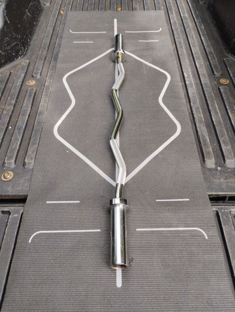 NEW OLYMPIC EZ CURL BAR (15 lbs)
= $50 • OLYMPIC 7 FT 6 FT 5 FT BARBELL BARS ALSO : AVAILABLE AS WELL AS A HEX BAR / PLATES / DUMBBELLS /