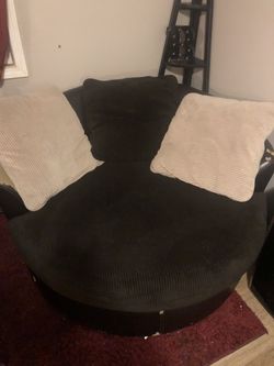 Big brown swivel chair
