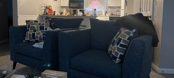 Two teal Accent Chairs