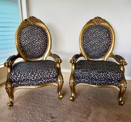 Leopard print arm chairs