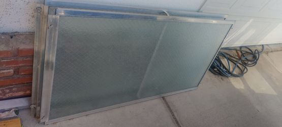 Glass shower doors, vintage , great replacements, mesh wire in them for safety