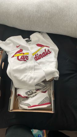 Toddler shoes and baseball jersey