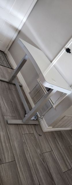 tresanti white adjustable desk with wireless charging pad and dual USBS on the side