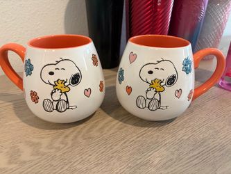 Two Snoopy mugs