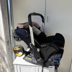 Doona Car Seat with Base and accessories