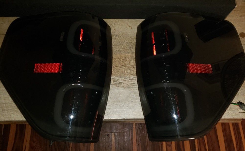 2009-2014  FORD F150 SMOKED LED TAIL LIGHTS.