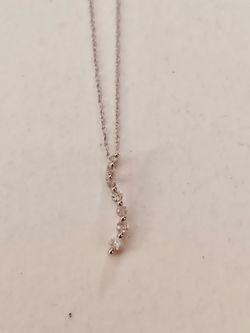 10k jewelry.  Beautiful 10k white gold Diamond Pendant and chain  approx 18 inch chain.