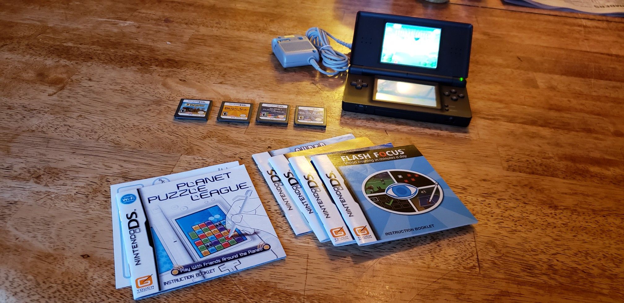 Nintendo DS lite with 5 games