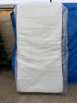 Twin size pillow top mattress, like new in bag