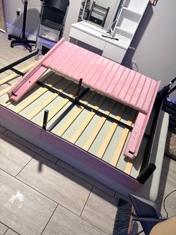 Full size pink bed with mattress
