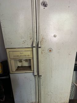 Whirlpool Side-by-Side Refrigerator with Ice Dispenser