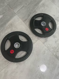 Cash only no zelle new pair of 35lb Olympic weights plates total 70lb urethane rubber material no slip weights