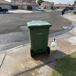 pressure washing trash cans!!!