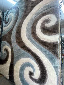 Shaggy Area Rug with Swirl Pattern