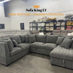 Free Delivery* Like New Gray Sectional Sofa with Pullout & Storage!