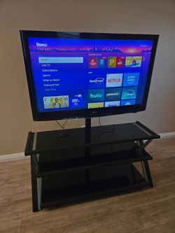 TV Stand and 50 inch TV