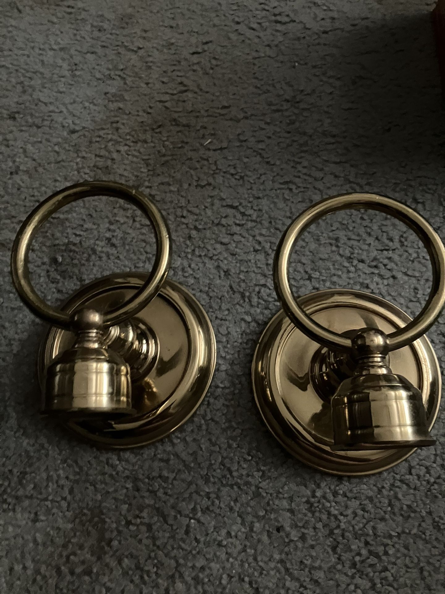 two brass candle holders and the vintage baking pan