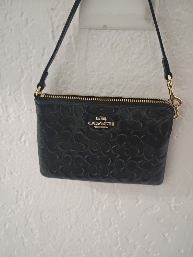 PAR DE BOLSAS COACH POR $70 O UNA POR $40