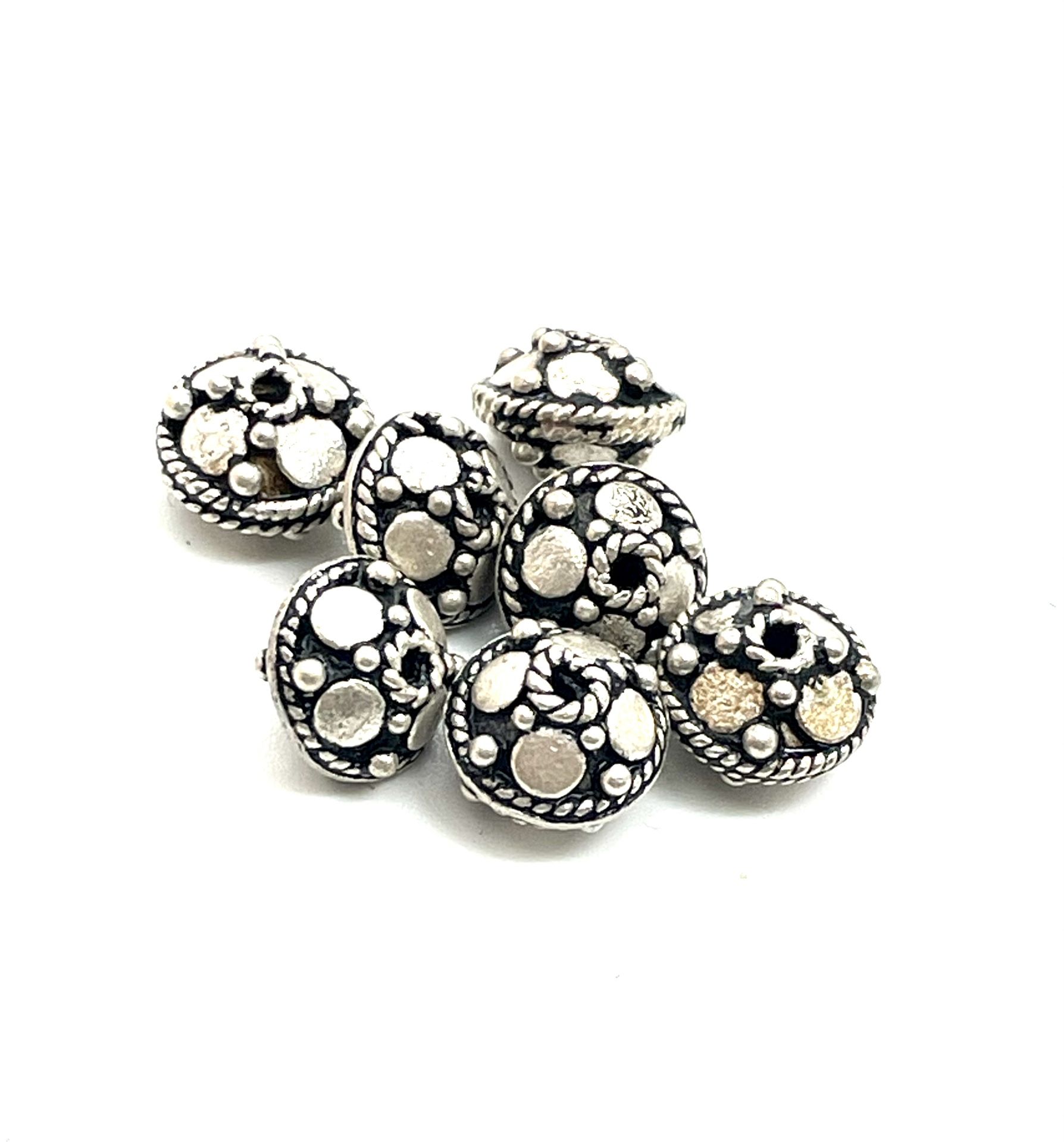 Two (2) Sterling Silver Bali Beads