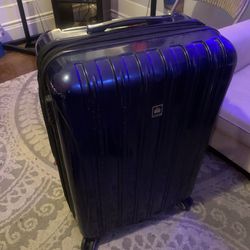 Large Delsey Luggage Case w/ wheels - Blue