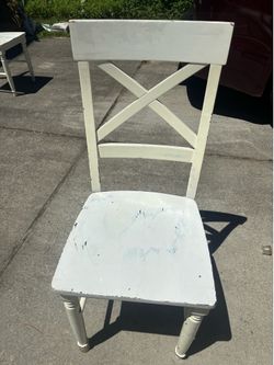 3 white chairs