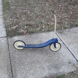 Is extremely rare all original 1930's scooter white Rims solid slick tires