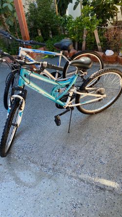 Two 26 inch mountain bikes ready for new owners