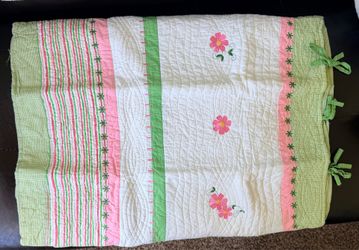 Quit blanket with a new pillow sham