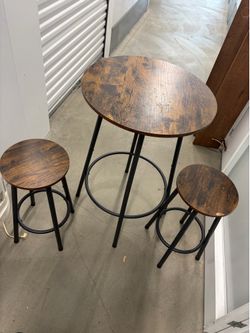 Small dining table with stools