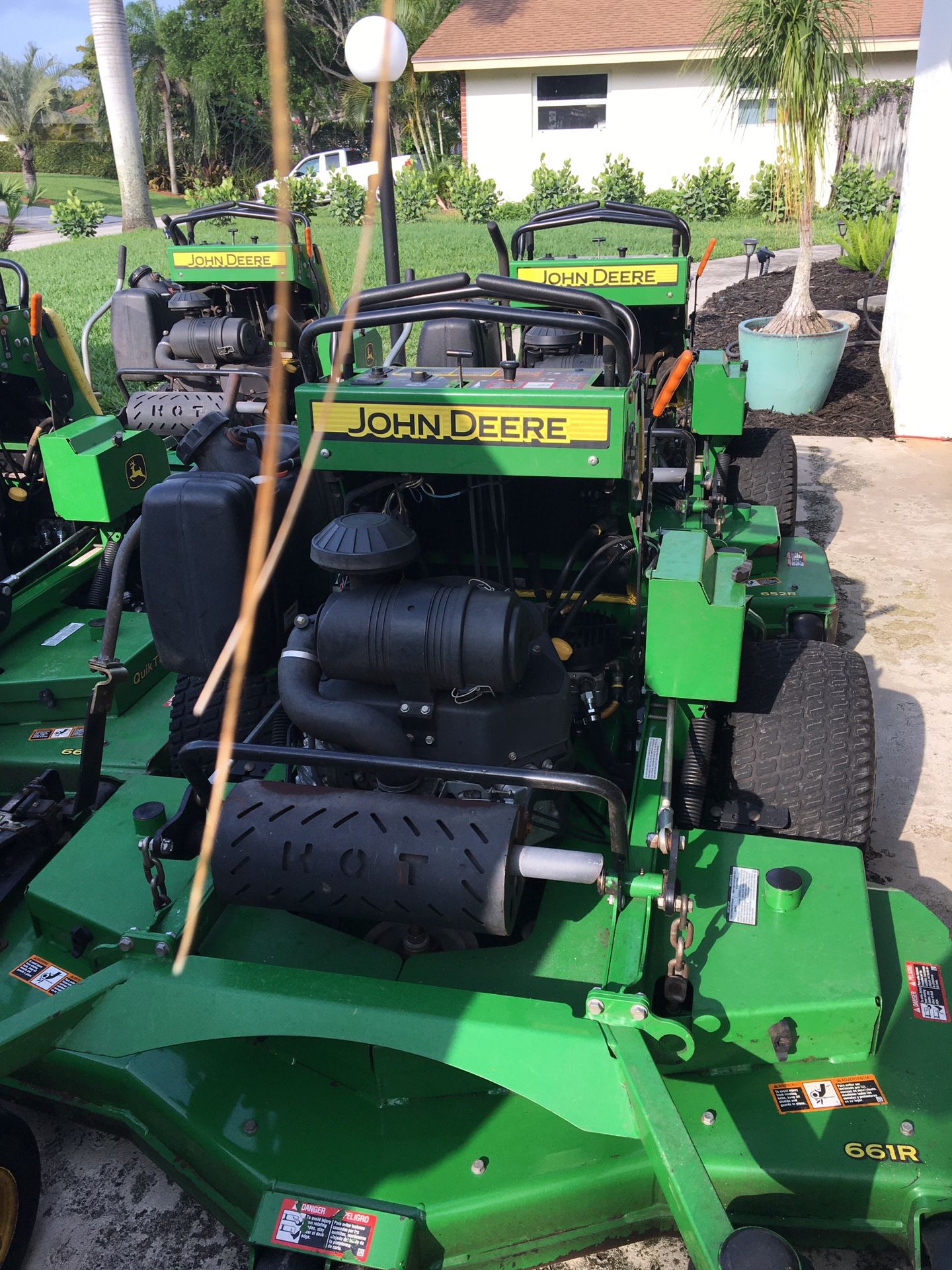 John Deere stand on mowers very clean well maintenance with Quick shoot 48 and 52 s