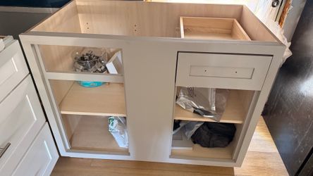 Gray Base Corner Kitchen Cabinet with Shelves and Drawer