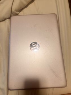 Pink HP laptop with charger