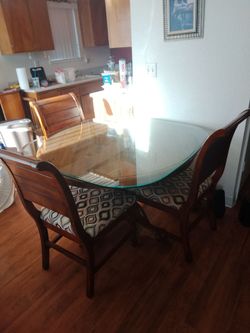 Unique Glass Top Kitchen and brown wooden Table with 4 chairs