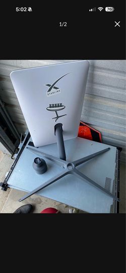 Starlink satellite dish setup with stand and mounting hardware included.
