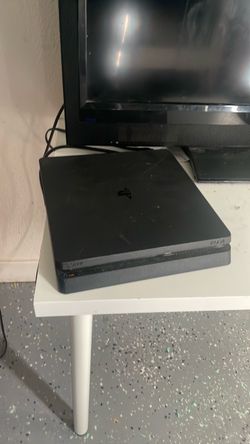 Used PS4 with one controller and 7 games