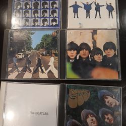 6 Beatles CD's in the case