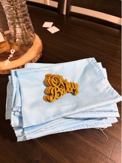 48 baby blue napkins and 11 oh baby gold letters