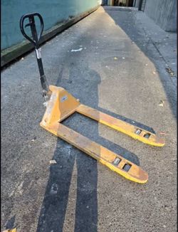 Two pallet jacks