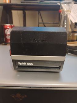 This is a vintage Polaroid Spirit 600 instant film camera.