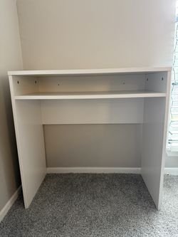 Brand new white desk- It was assembled but never used